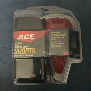 Compression shorts and protective cup